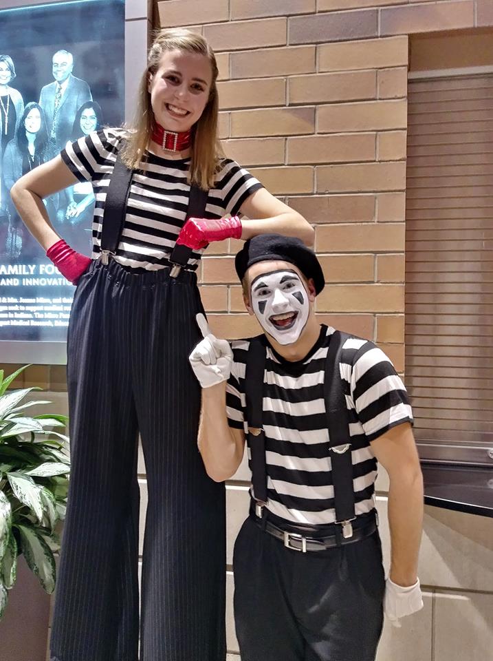 mime entertainment; stilt walking entertainment; themed entertainment